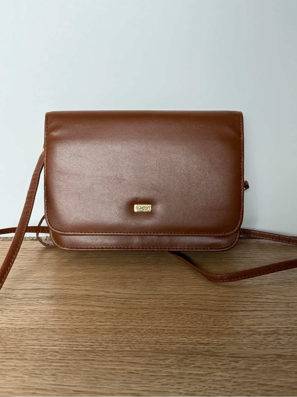 Buxton Cognac Brown Leather Crossbody with Gold Plaque